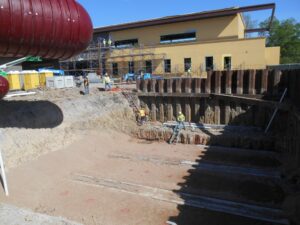 1 tanks being installed in shored excavation