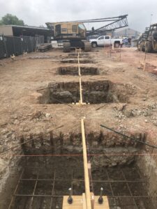 9 canopy footings being installed